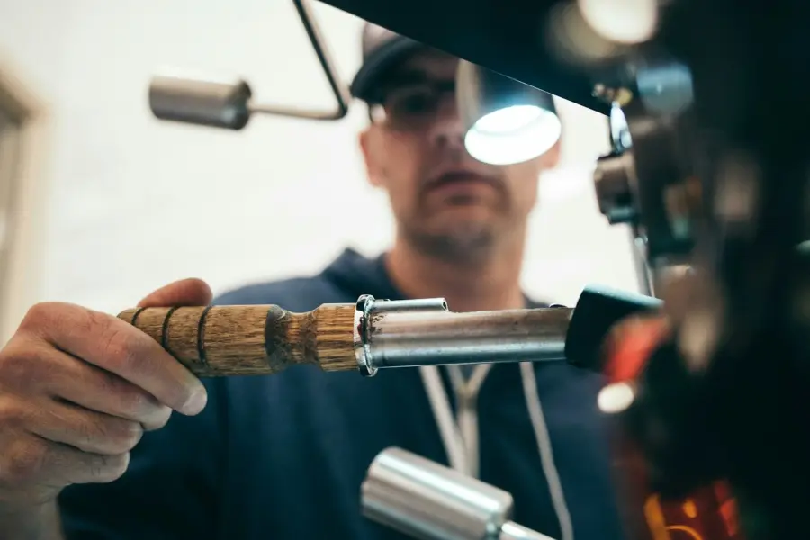 Technician working with a pipe inspection tool